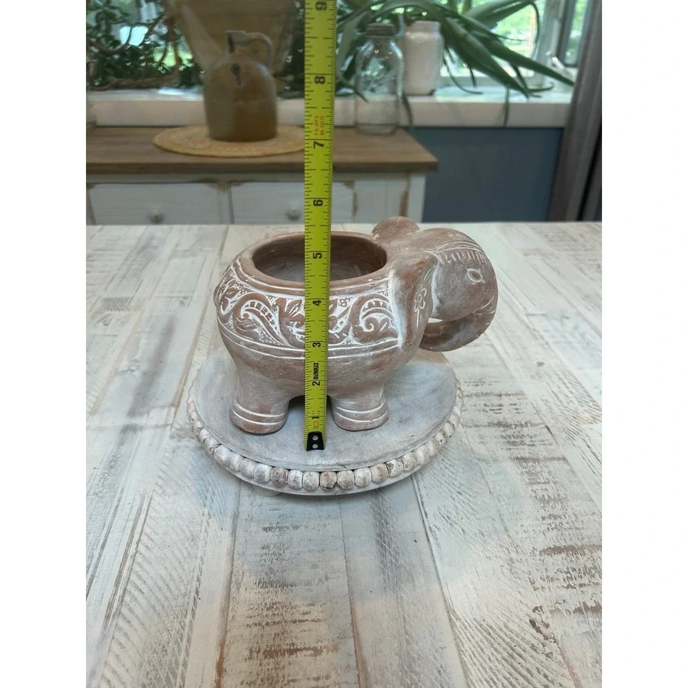 Terracotta white washed elephant‎ planter.